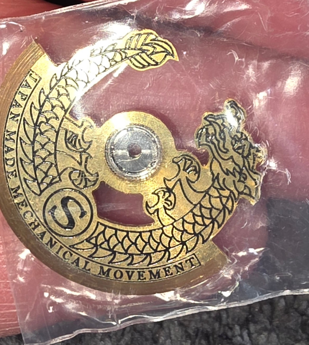 Gold dragon watch part