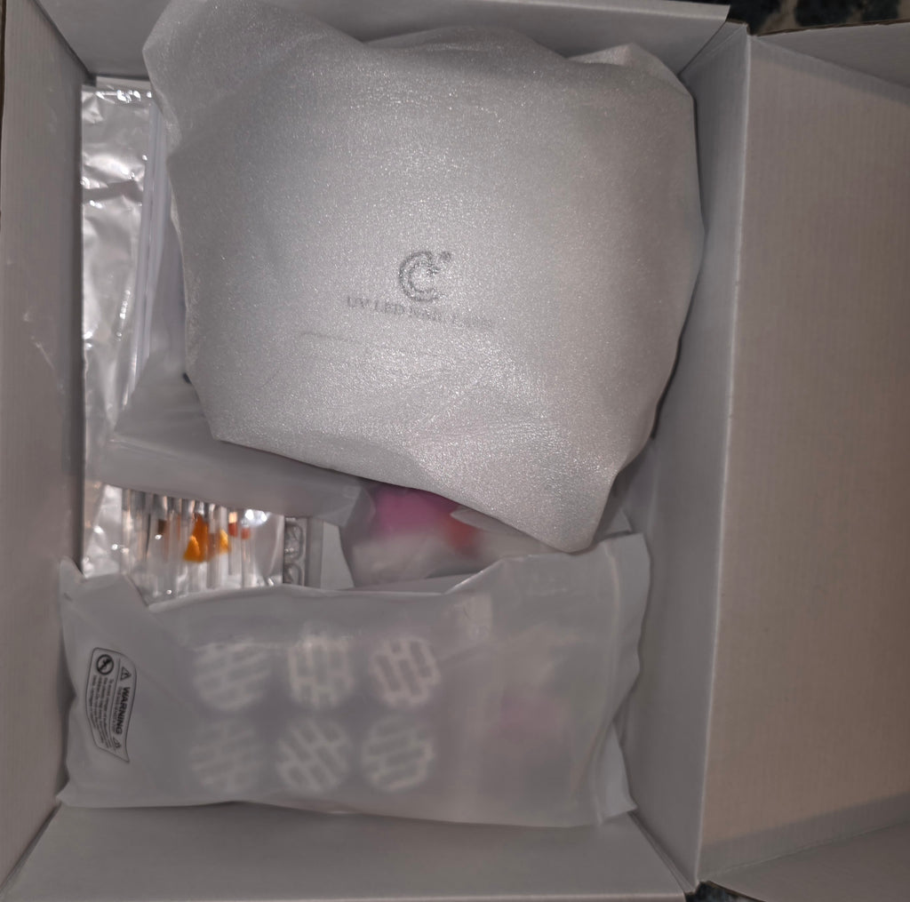 Complete nail kit with dryer and dremel