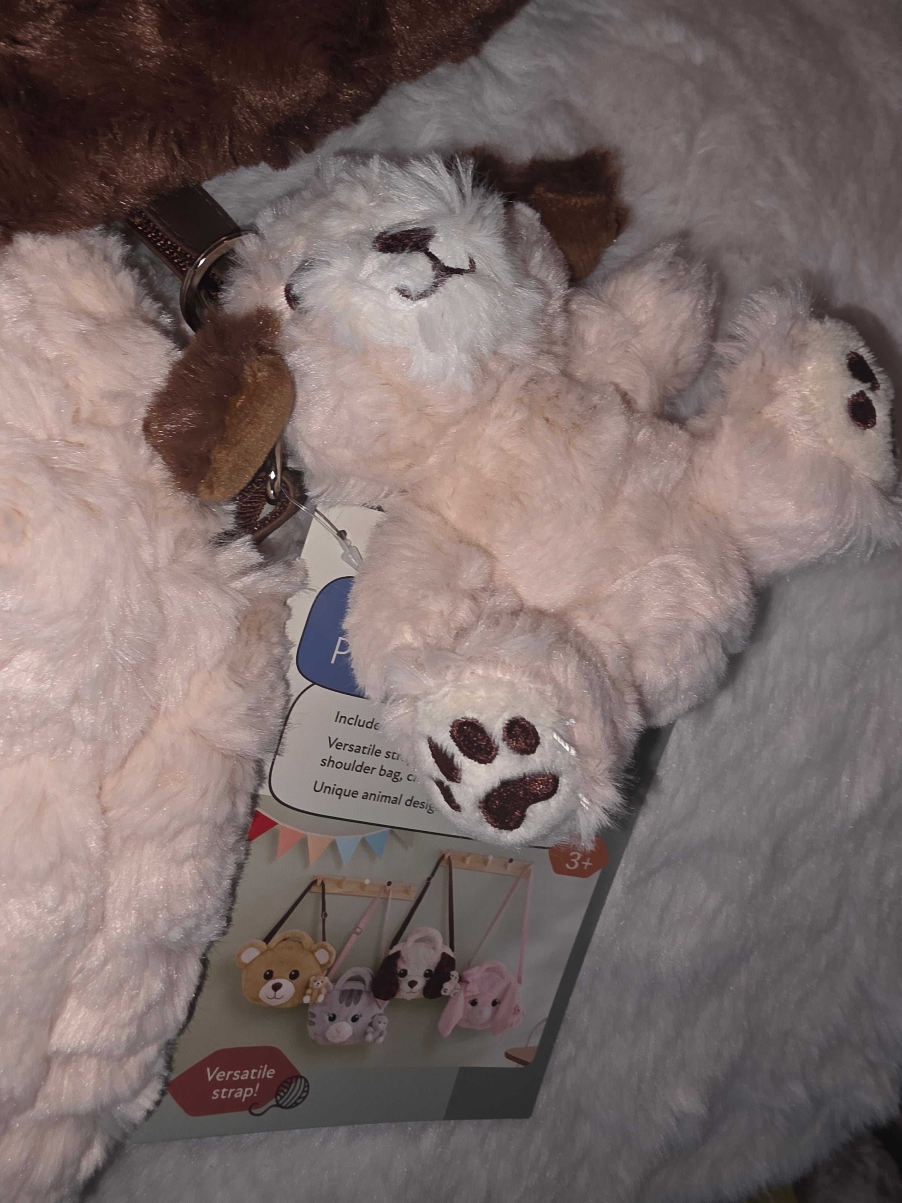 Doggy Bag with strap and handels and a plushie