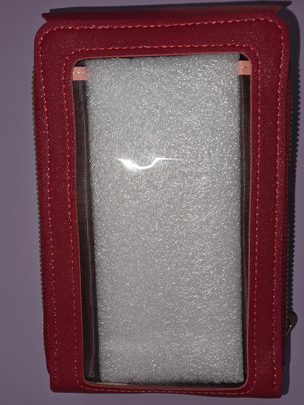 Small shiny red crossbody purse with strap