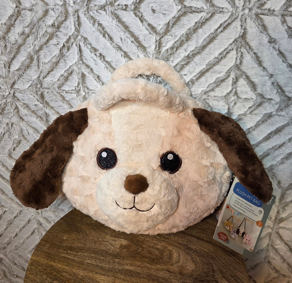 Doggy Bag with strap and handels and a plushie