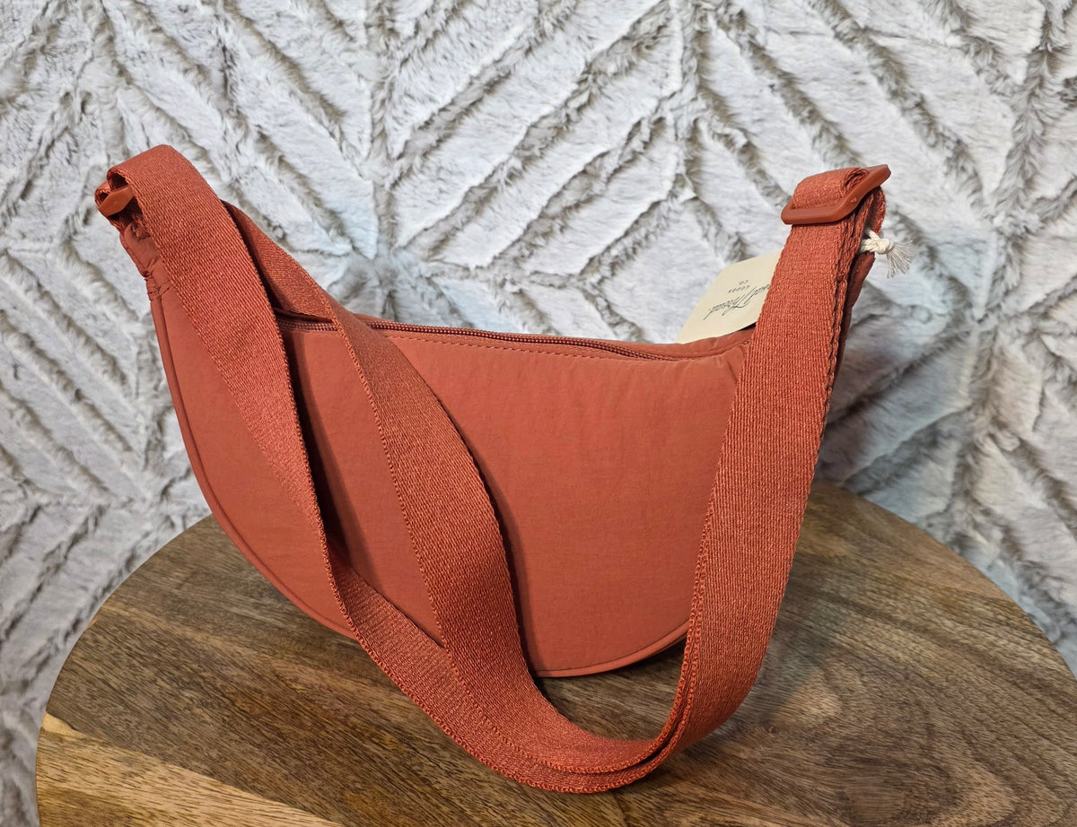 Universal thread co dark orange crescent shape purse