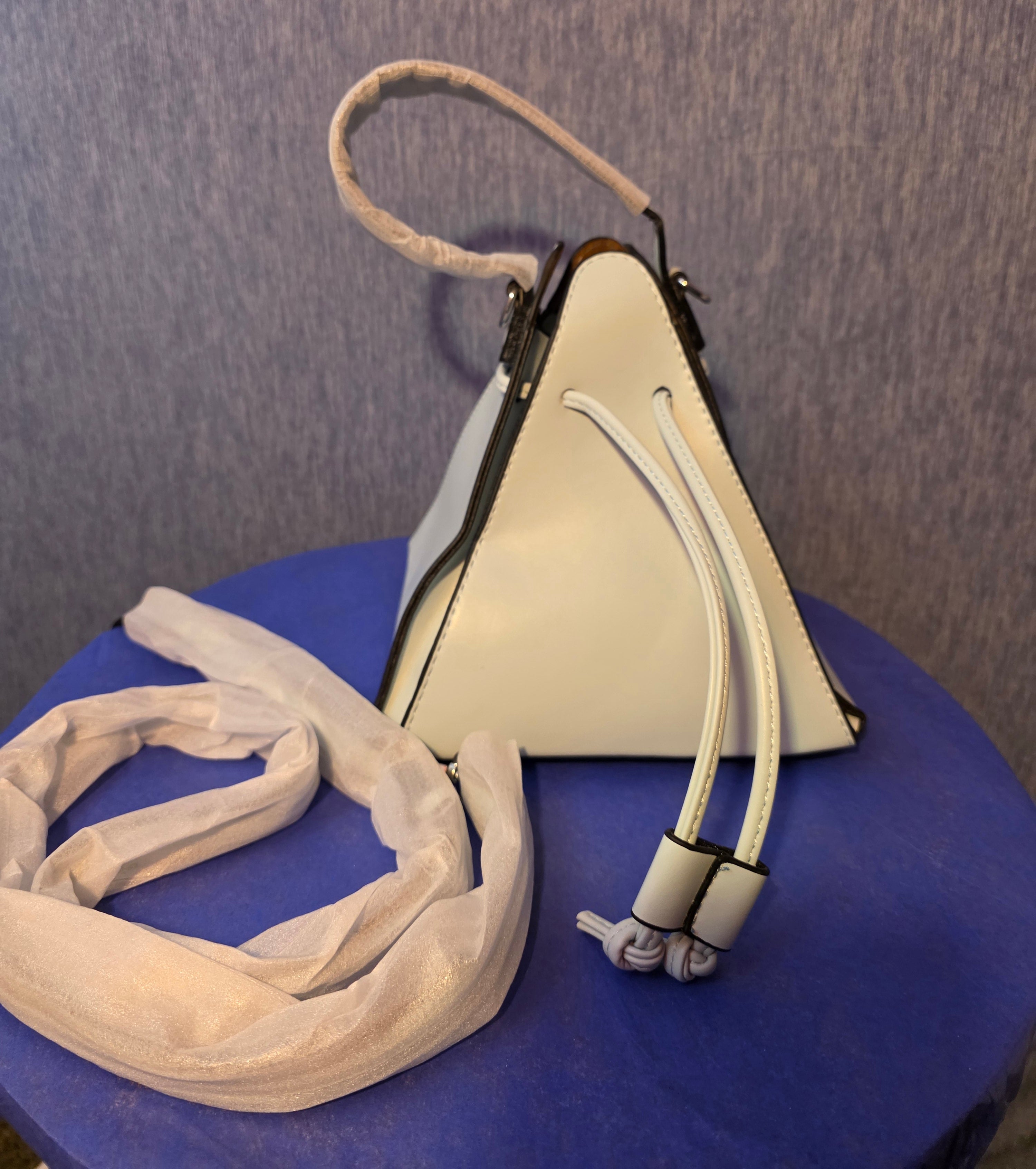 Light blue purse comes with a strap