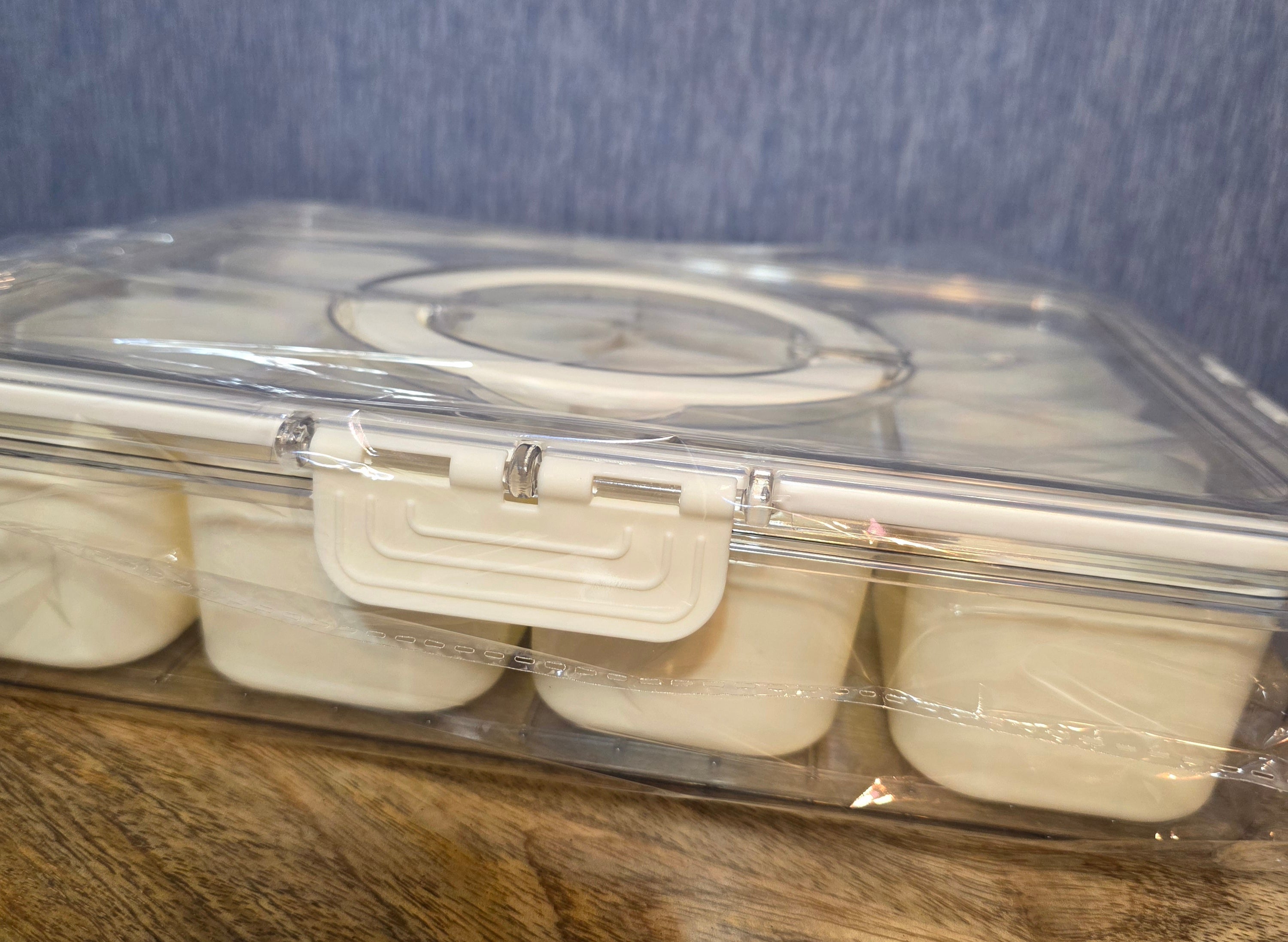 Plastic storage container with 8 cups inside