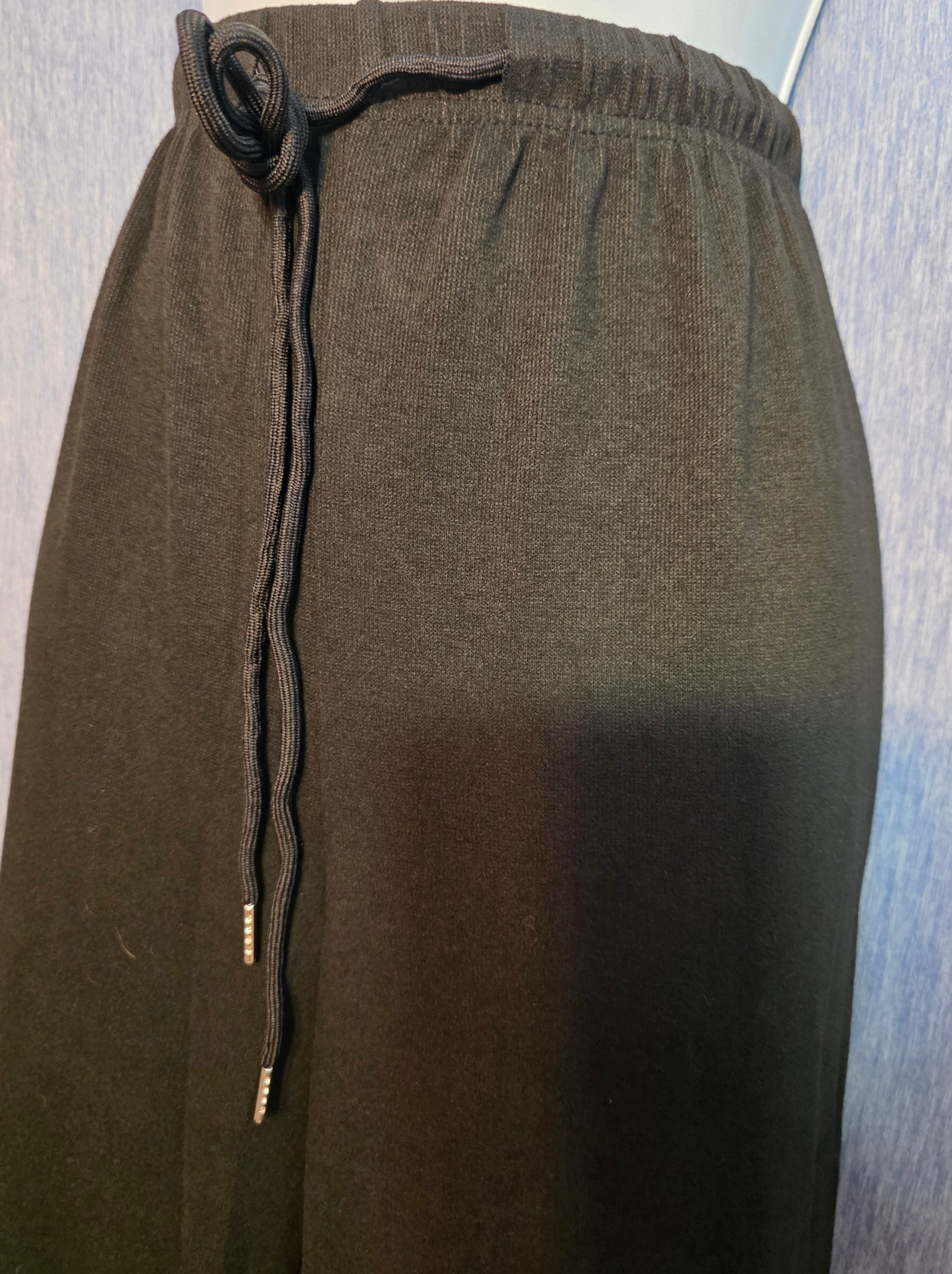 Black sweat pants pockets on each side flare leg very soft