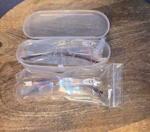 2 pair of reading glasses + 2.50