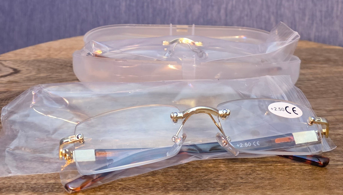 2 pair of reading glasses + 2.50