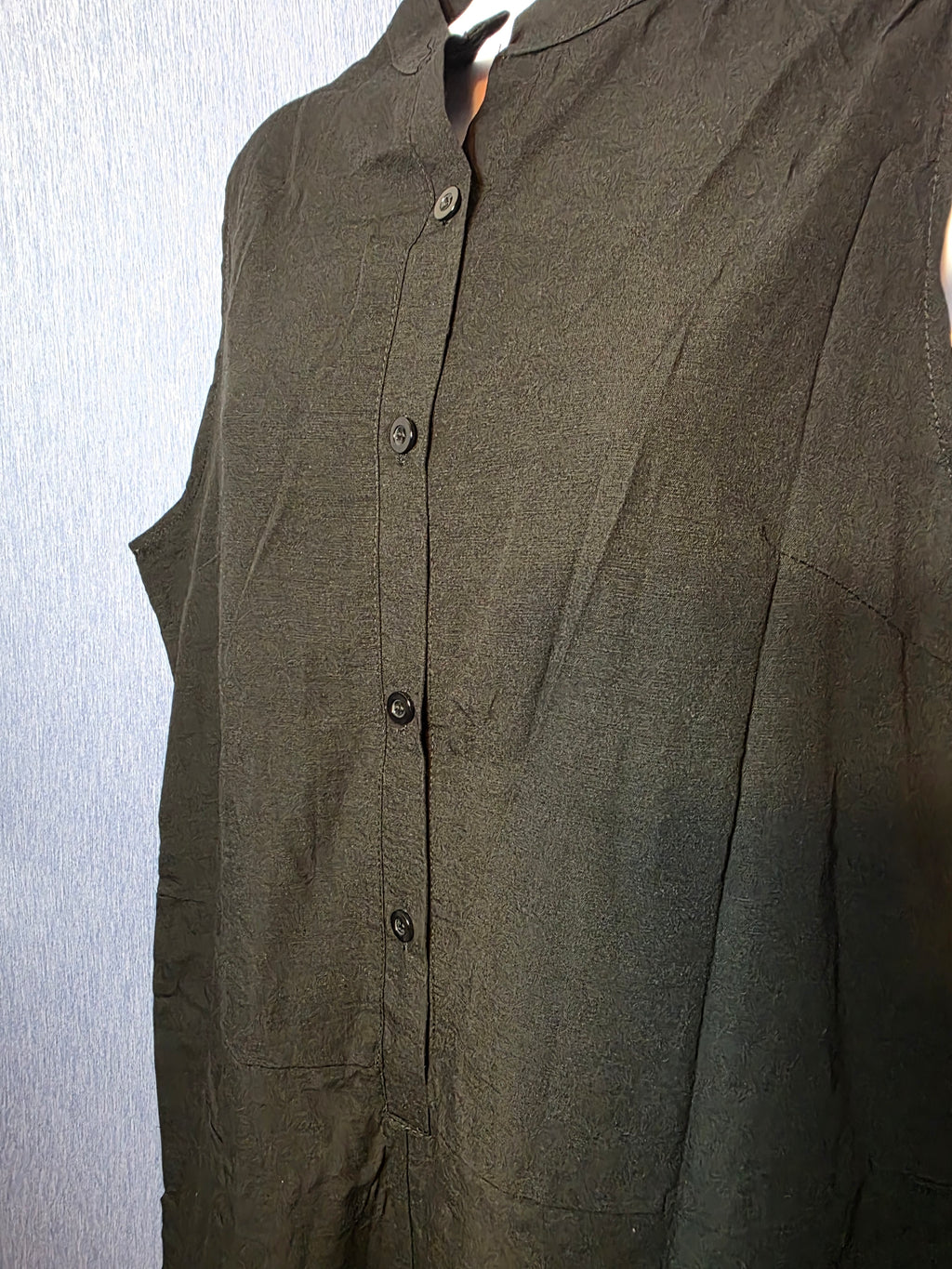 Black jumper button up front in size large
