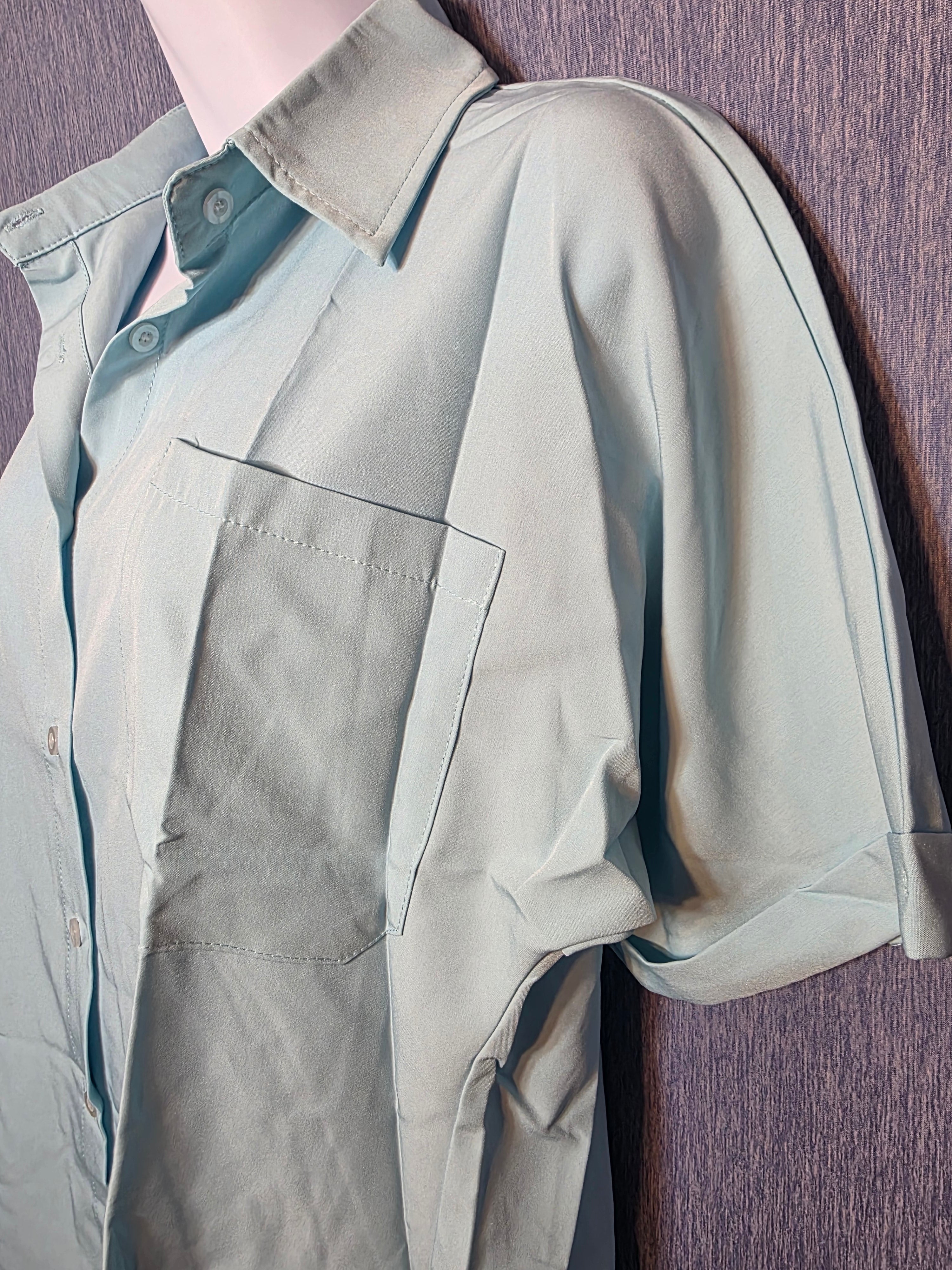 Button up top size meduim baby blue in color