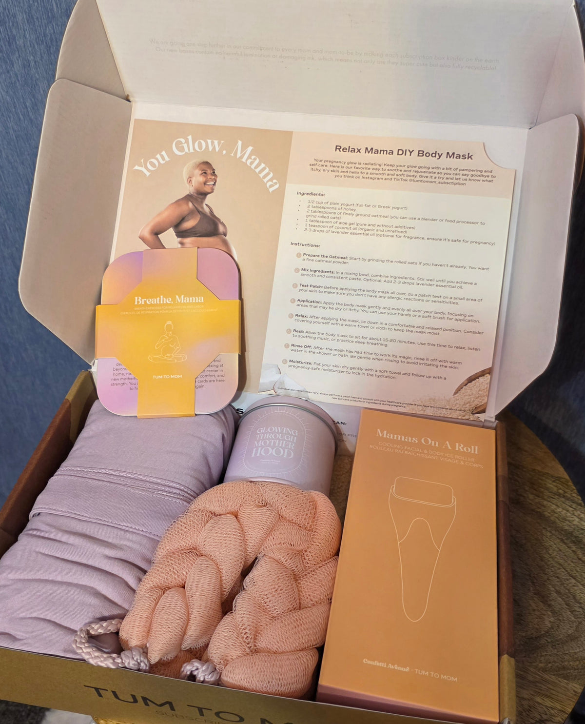 Tum to Mom set with a large pillow for relaxing comes with body scrubber / meduim house shoes meduim robe / scented candle face roller