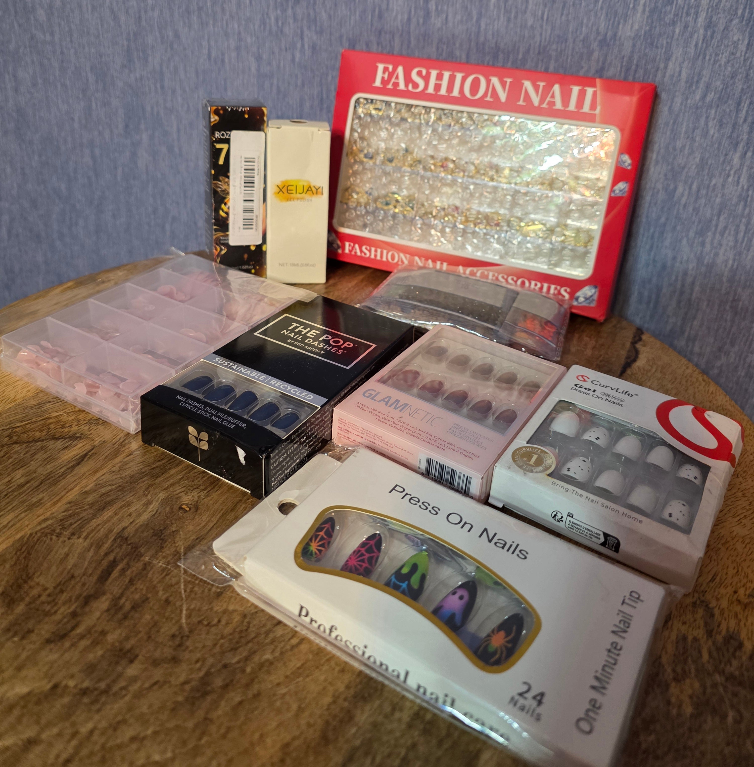 Nail Fun bundle 4 pairs of glue on nails , 1 pack nail art , sparkle to glue on nails, 1 pack of tips , 1 bottle gel polish, 1 bottle 7 day plus for nail health