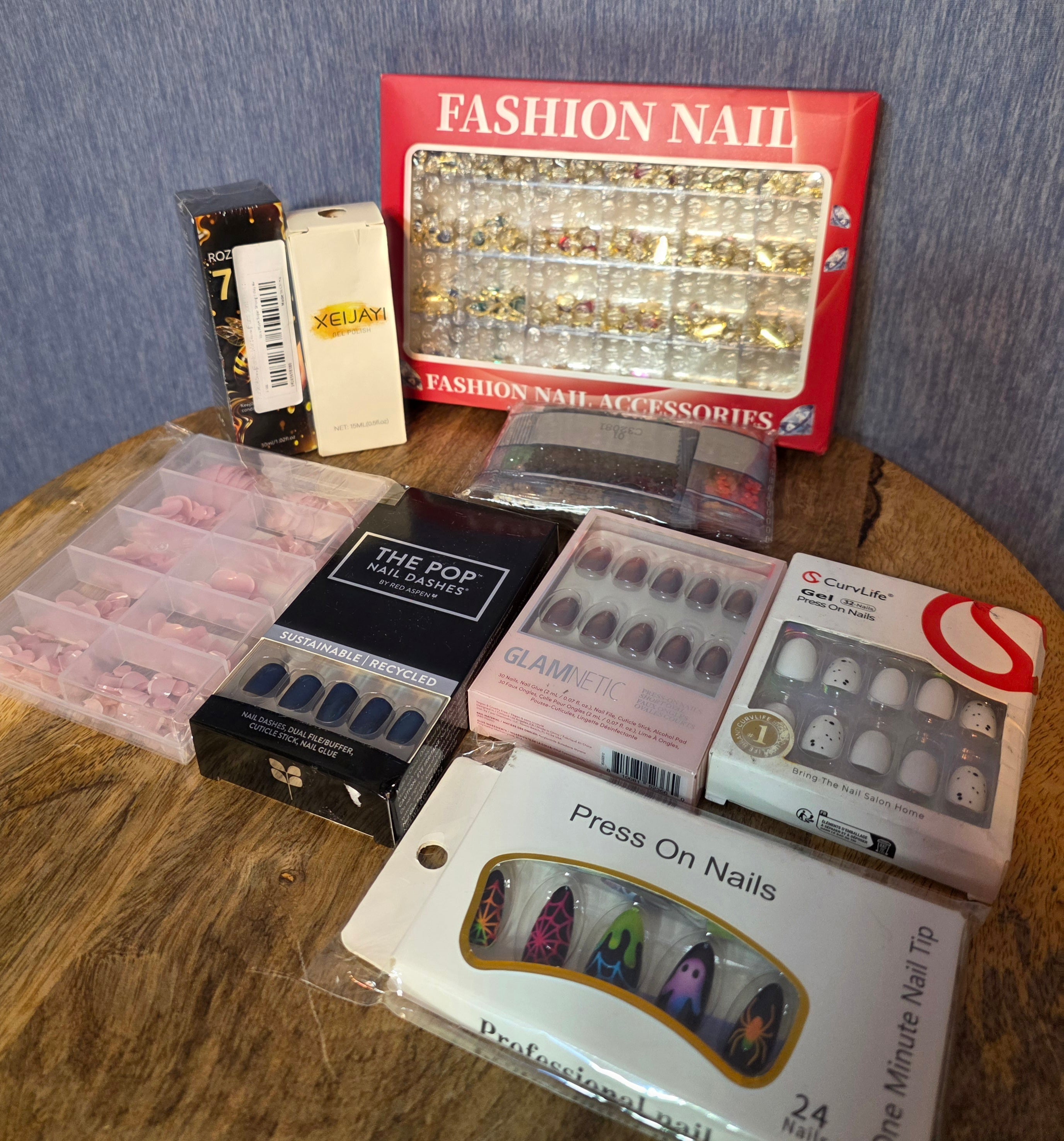 Nail Fun bundle 4 pairs of glue on nails , 1 pack nail art , sparkle to glue on nails, 1 pack of tips , 1 bottle gel polish, 1 bottle 7 day plus for nail health