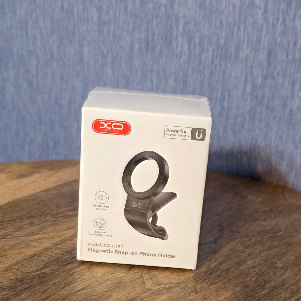 Magnetic snap on phone holder