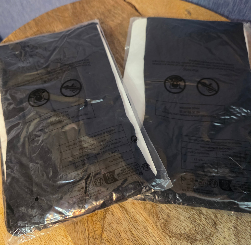 Two pair of black pantihose with feet