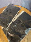 Two pair of black pantihose with feet