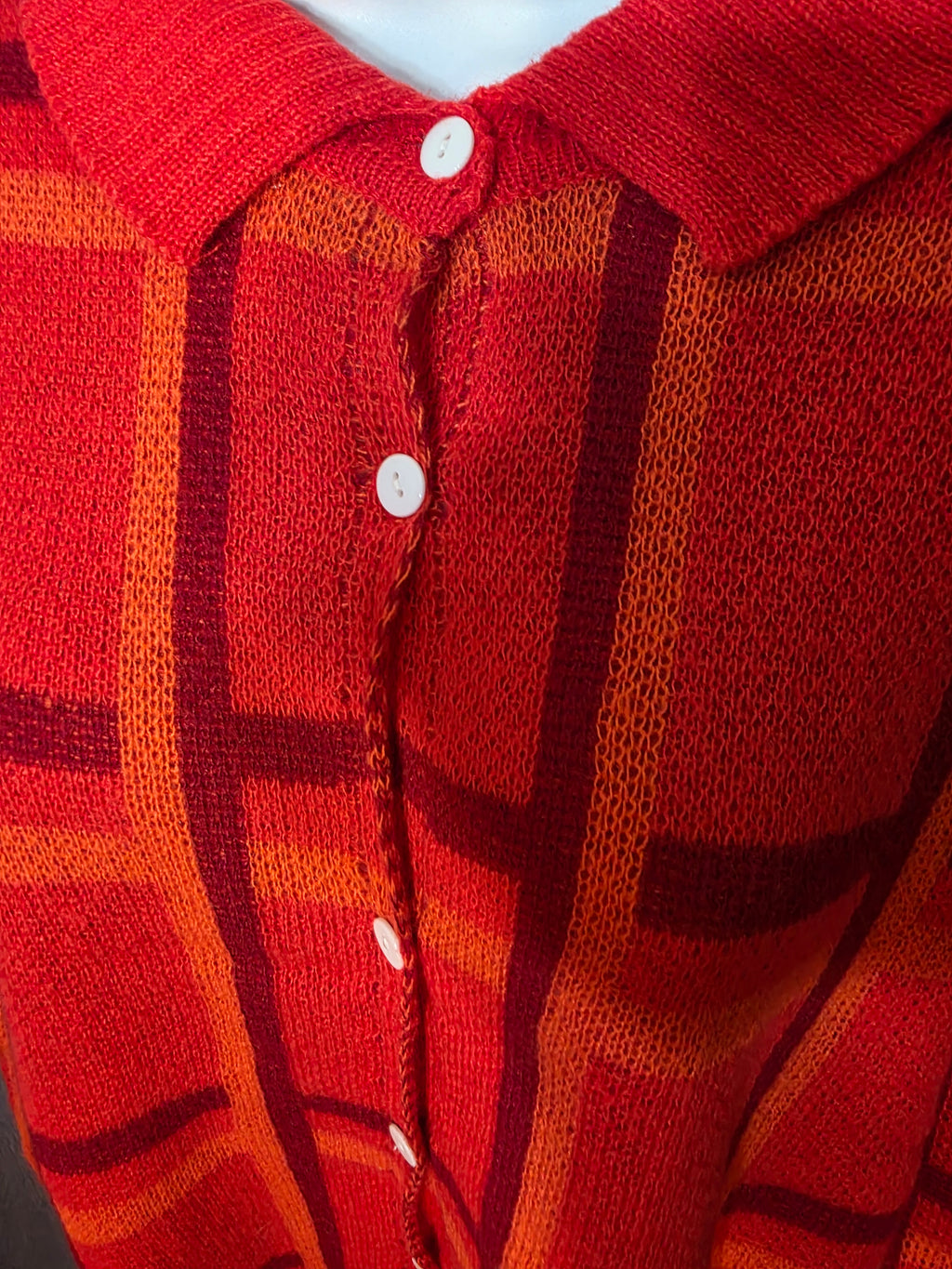 Light sweater buttons up front