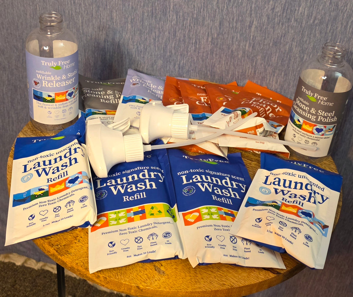 Truly Free cleaning bundle / 4 laundry wash refills / 1 stone and steal polish with bottle / 1 wrinkle release spray with bottle/ 4 floor cleaner refills / 2 toilet bowl cleaner refills with bottle