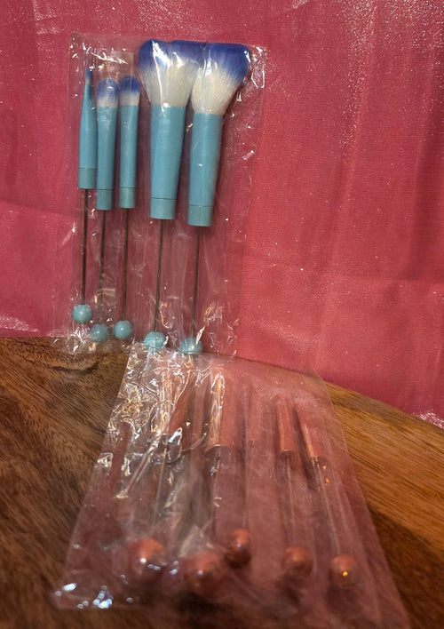 2 packs of makeup brushes pink and blue